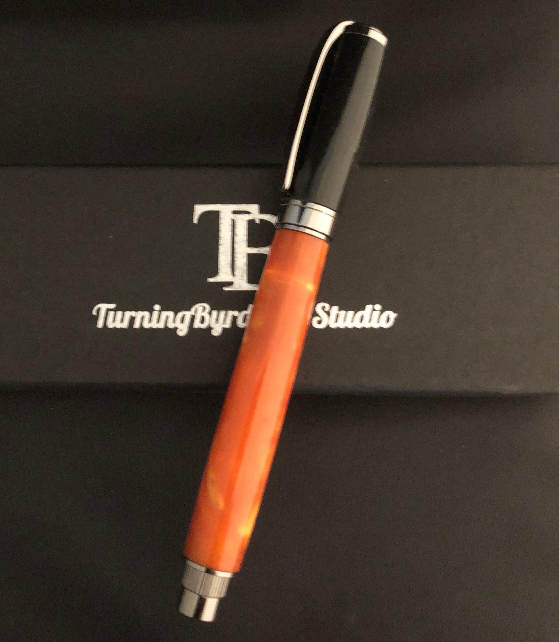 Black and mango resin with magnetic cap rollerball