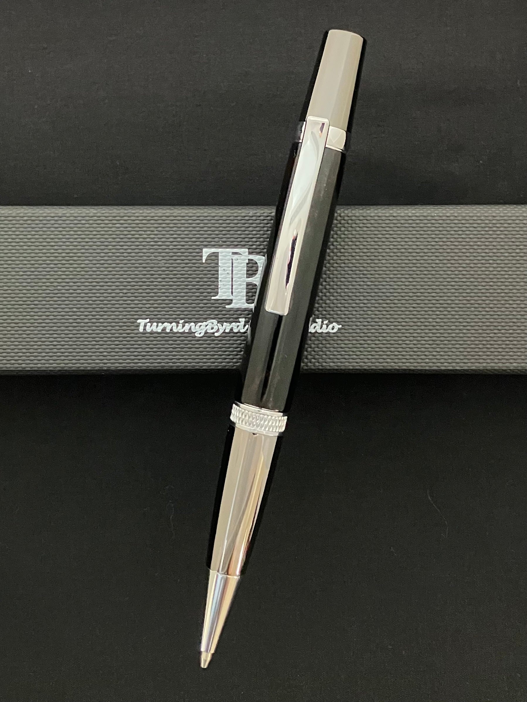 Nigerian Ebony with Platinum and black titanium plating