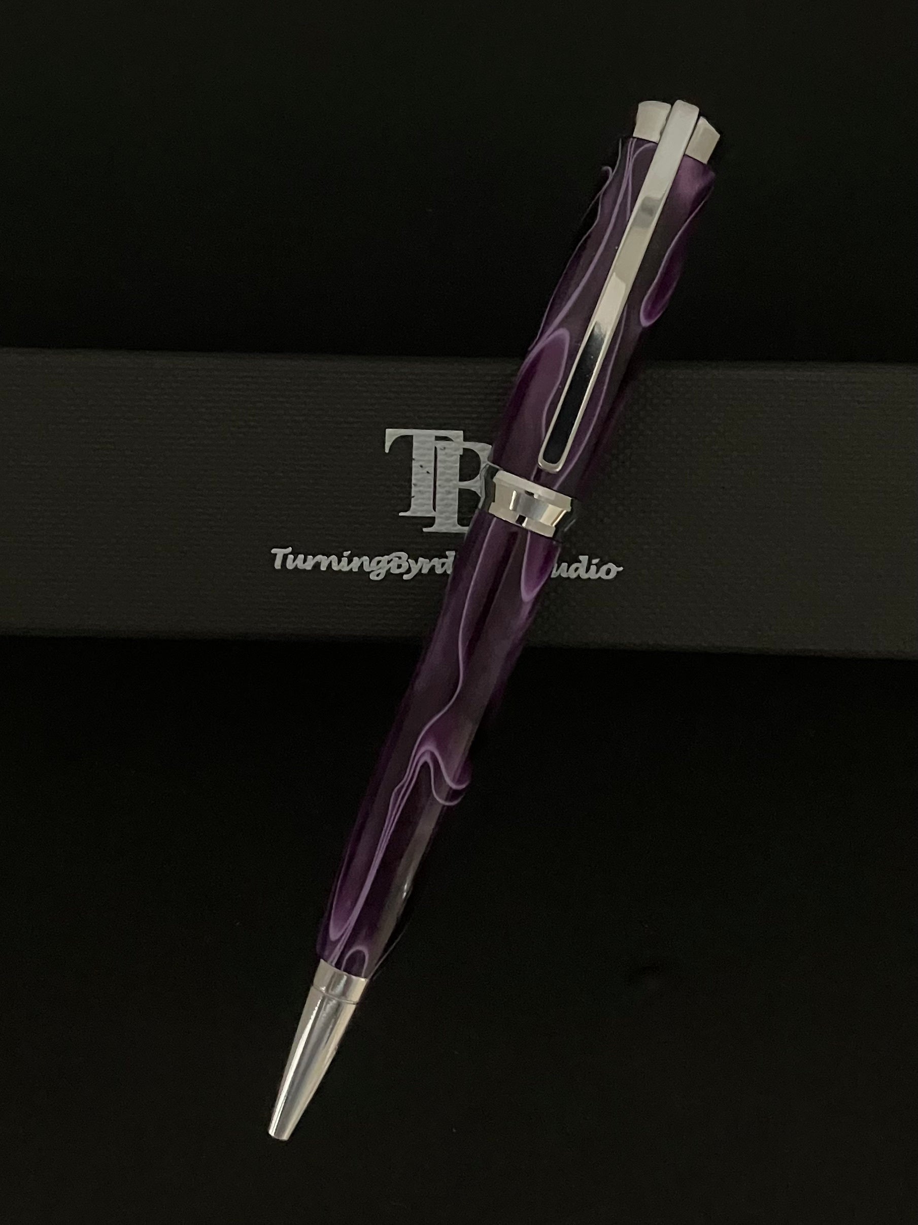 Purple with white ribbons on a chrome body