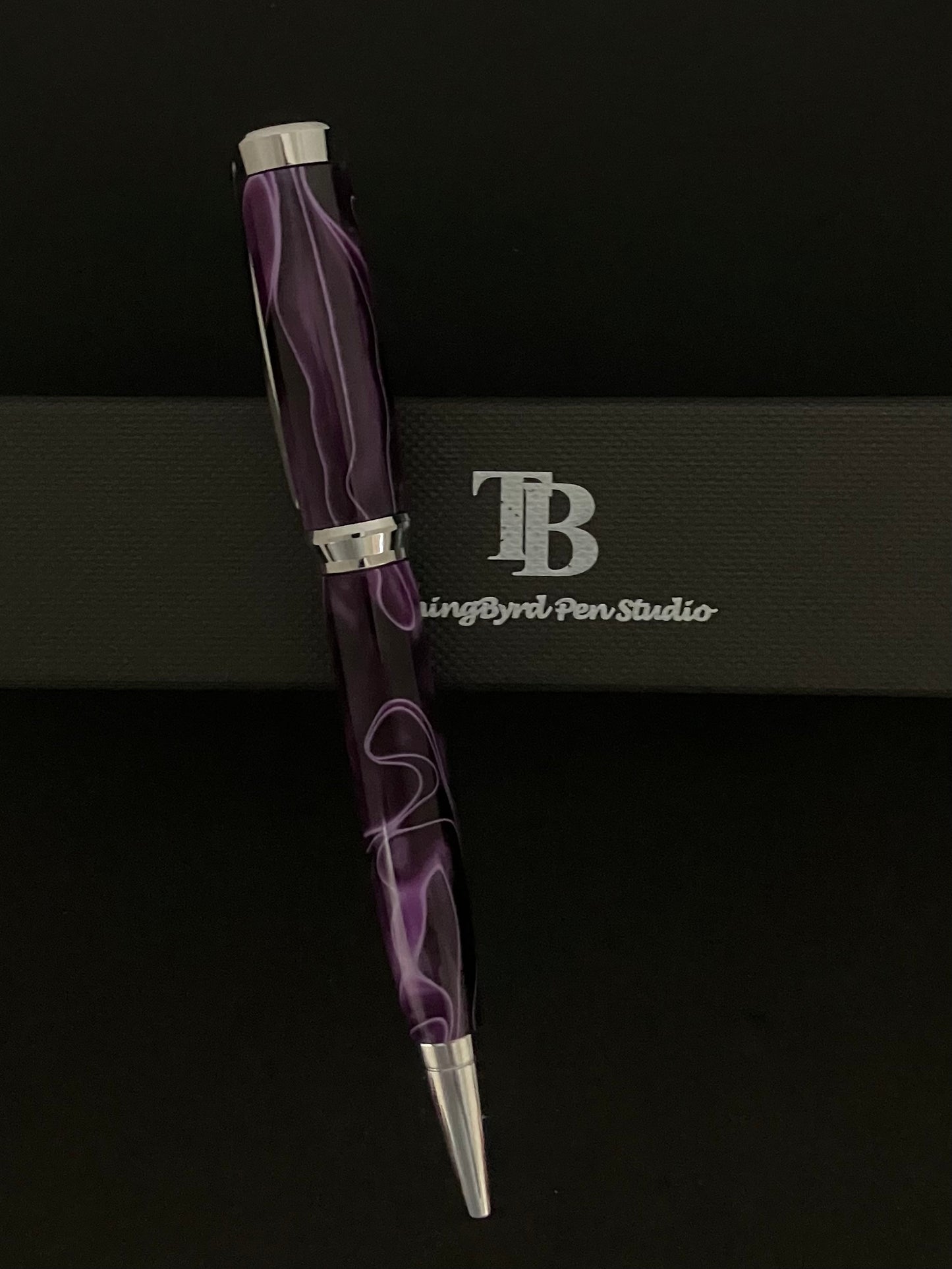 Purple with white ribbons on a chrome body