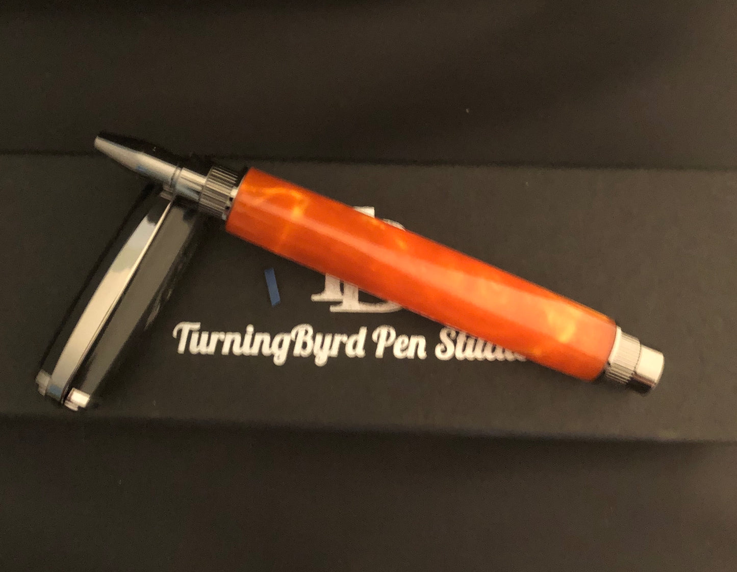 Black and mango resin with magnetic cap rollerball