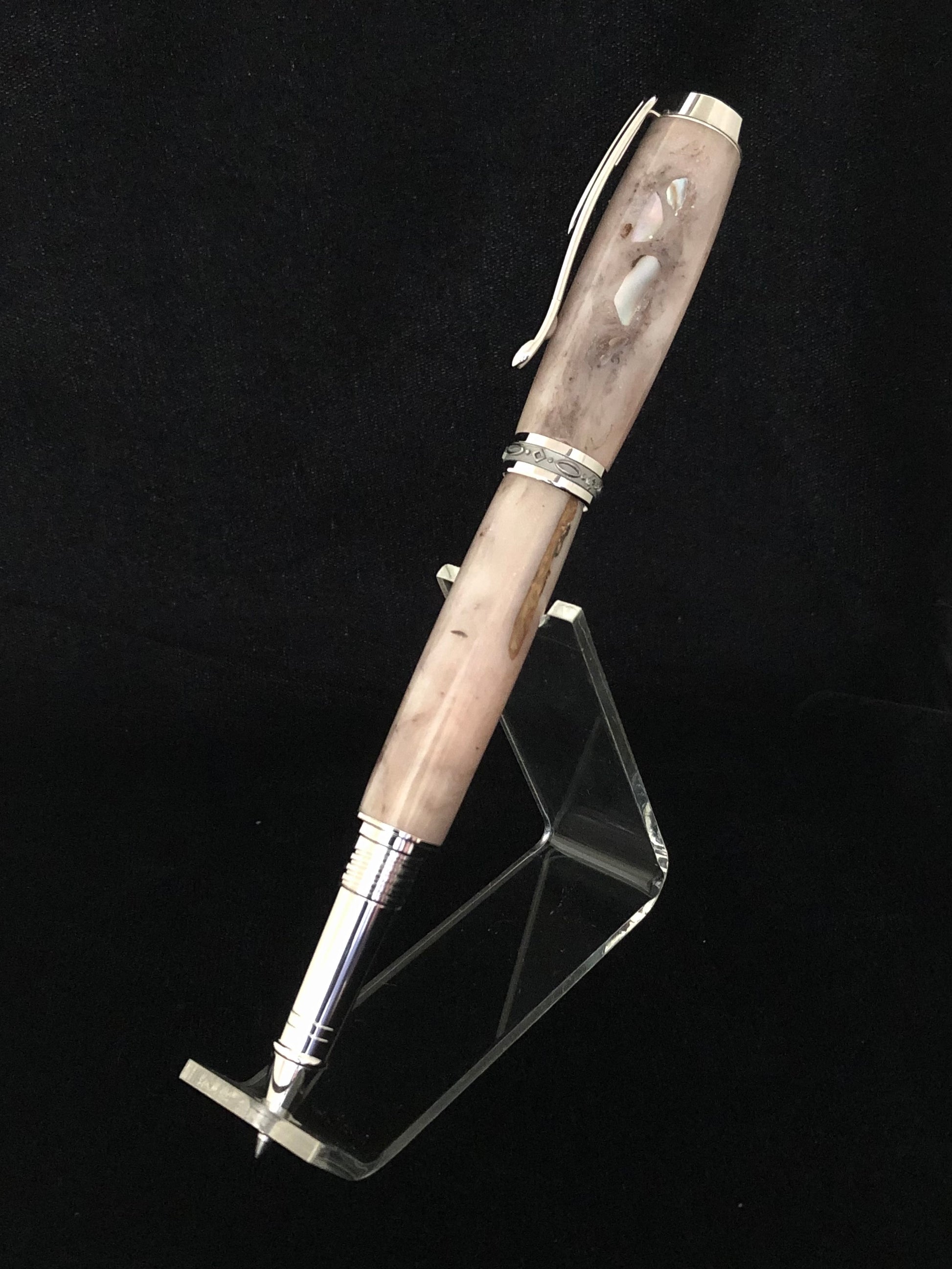 sand. colored resin with bits of sea shells rollerball pen